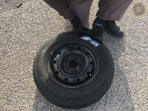 Trooper finds bags of drugs hidden in a spare tire