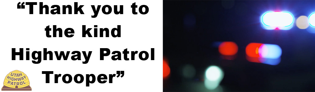 Image shows blurred police car lights and text reads Thank you to the kind Highway Patrol Trooper