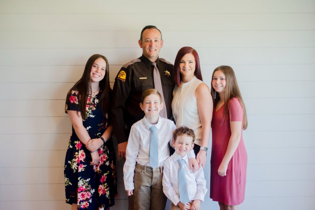 Trooper Eddie Wright poses with his wife and four children