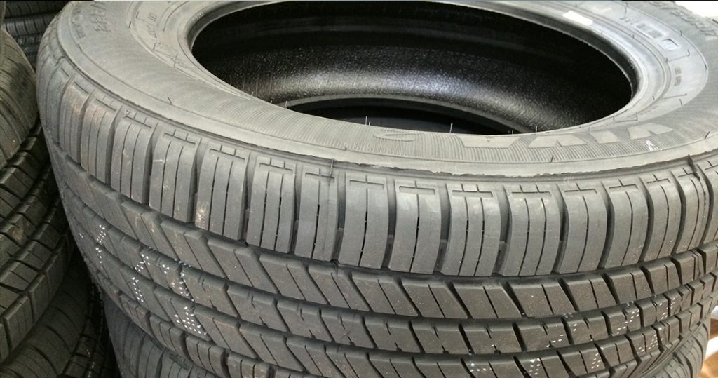 Close up of a stack of unused tires